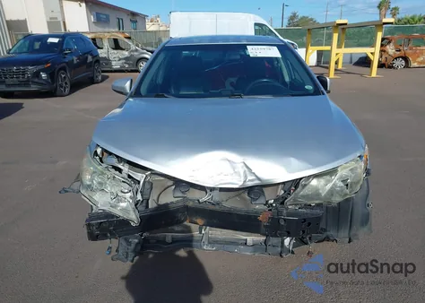 2014 Toyota Camry from USA, damaged, VIN 4T1BF1FK9EU395913